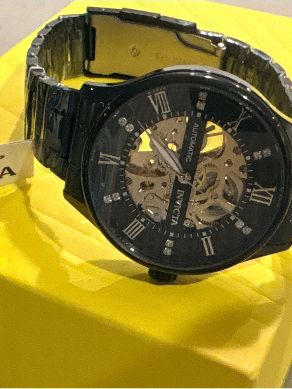 Invicta Men’s Black and Gold Skeleton Mechanical Watch